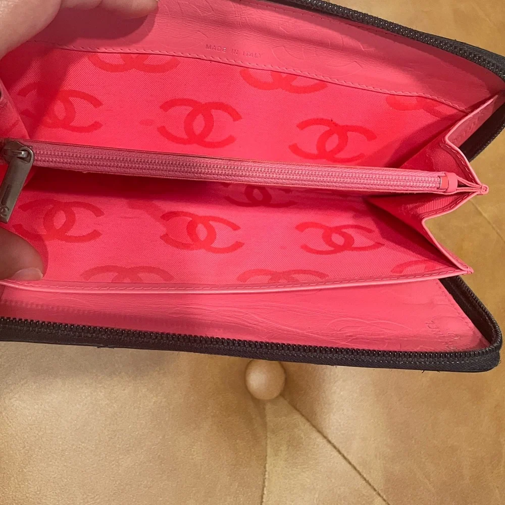 CHANEL Black Quilted CC Zip-Around Wristlet Clutch